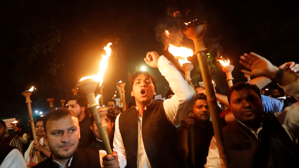 Members of the youth wing of India's main opposition Congress party shout slogans during a protest against the Citizenship Amendment Bill in New Delhi
