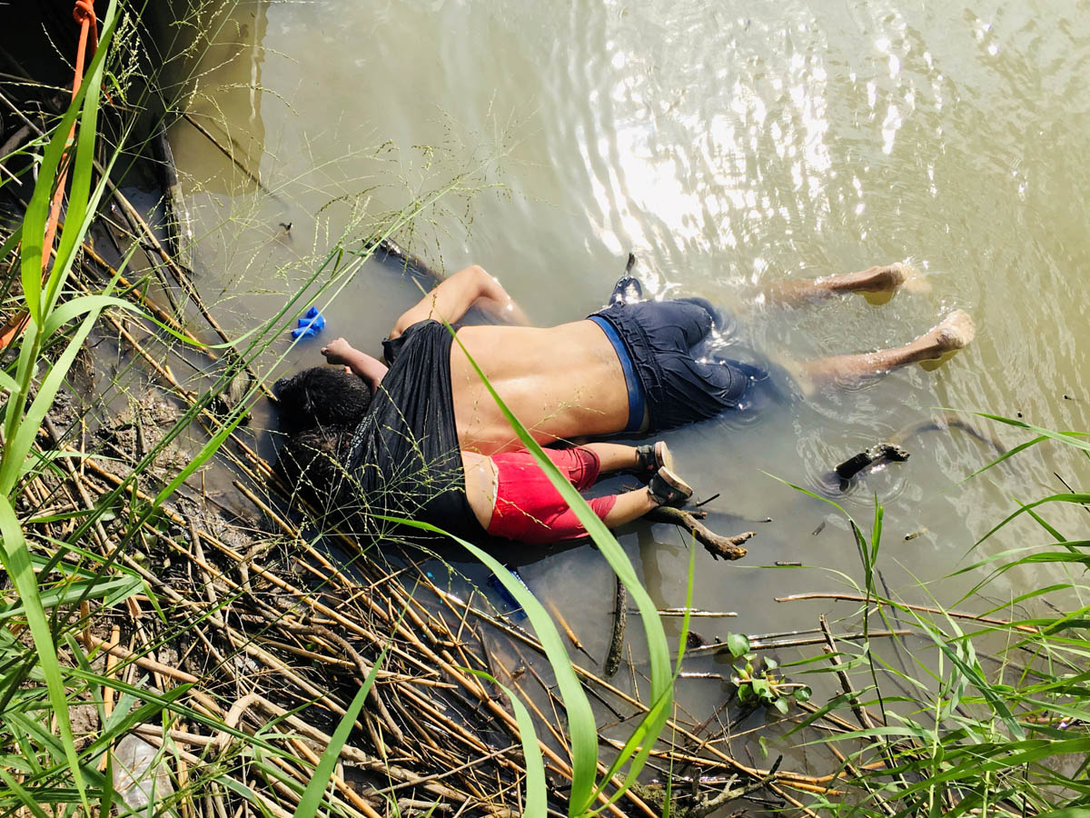 The bodies of Salvadoran migrant Oscar Alberto Martinez Ramirez and his daughter Valeria lie in the Rio Bravo river in Matamoros, in Tamaulipas state, Mexico June 24, 2019. REUTERS/Stringer