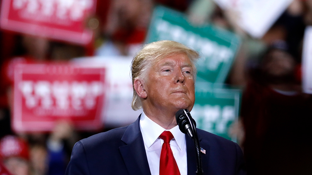 US President Donald Trump speaks during a Keep America Great Rally at Kellogg Arena December 18, 2019, in Battle Creek, Michigan. (Photo by JEFF KOWALSKY / AFP)
