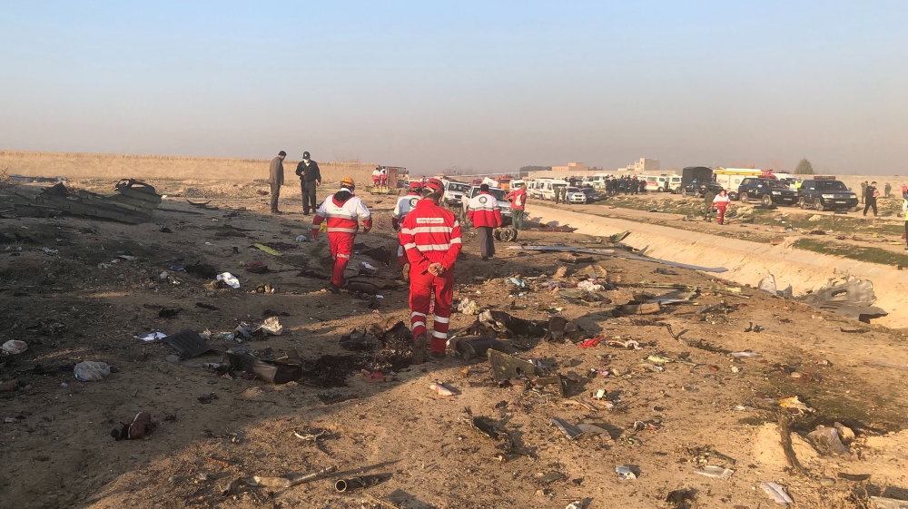 Debris is seen from a plane crash on the outskirts of Tehran, Iran, Wednesday, Jan. 8, 2019. A Ukrainian airplane carrying at least 170 people crashed on Wednesday shortly after takeoff from Tehran’