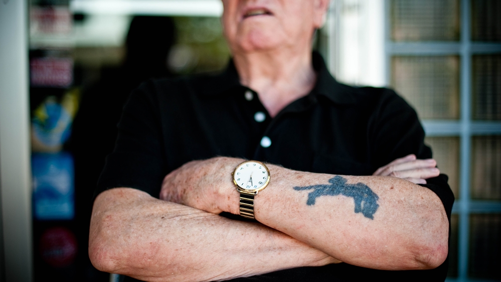 Leon Schagrin covered up the ‘161744’ tattooed on his left forearm at Auschwitz with a black panther he got in New York City in the mid-1960s [Courtney Ortiz, courtesy of Stephen Shooster]