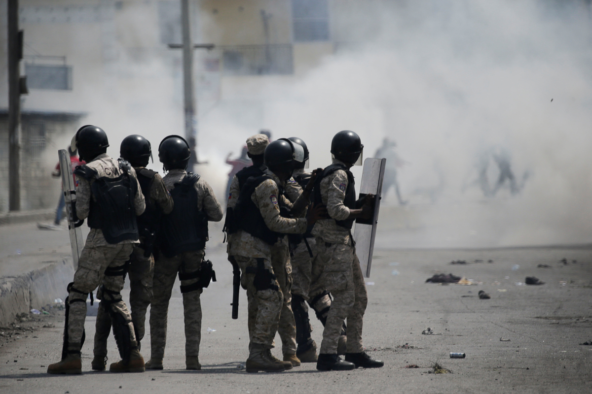Security forces hold their shields during a demonstration to demand the resignation of Haitian president Jovenel Moise, in the streets of Port-au-Prince, Haiti October 4, 2019. REUTERS/Andres Martinez