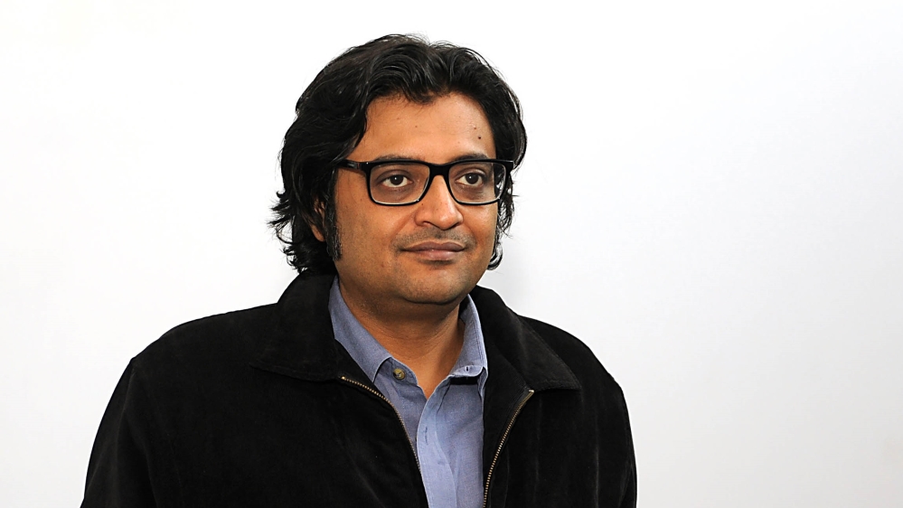 Indian television journalist Arnab Goswami gestures during an interview with AFP in Mumbai.  Four Indian airlines have banned a top stand-up comic Kunal Kamra for a midair confrontation with Arnab Gos