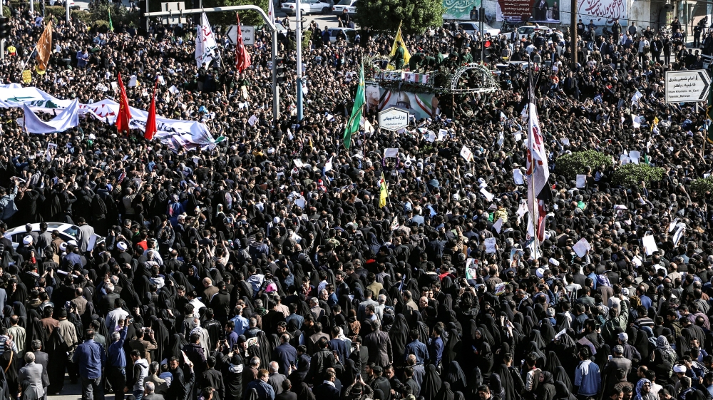 People attend a funeral procession for Iranian Major-General Qassem Soleimani, head of the elite Quds Force, and Iraqi militia commander Abu Mahdi al-Muhandis, who were killed in an air strike at Bagh