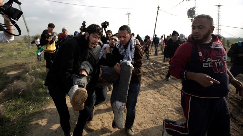 Shot at the fence - Majed Abusalama