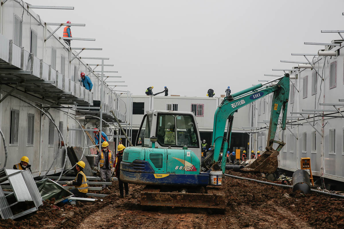 WUHAN, CHINA - FEBRUARY 03: Workers build hospital on February 3, 2020 in Wuhan, China. After only 10 days of construction, Wuhan Huoshenshan Hospital was officially completed and delivered, and on Fe