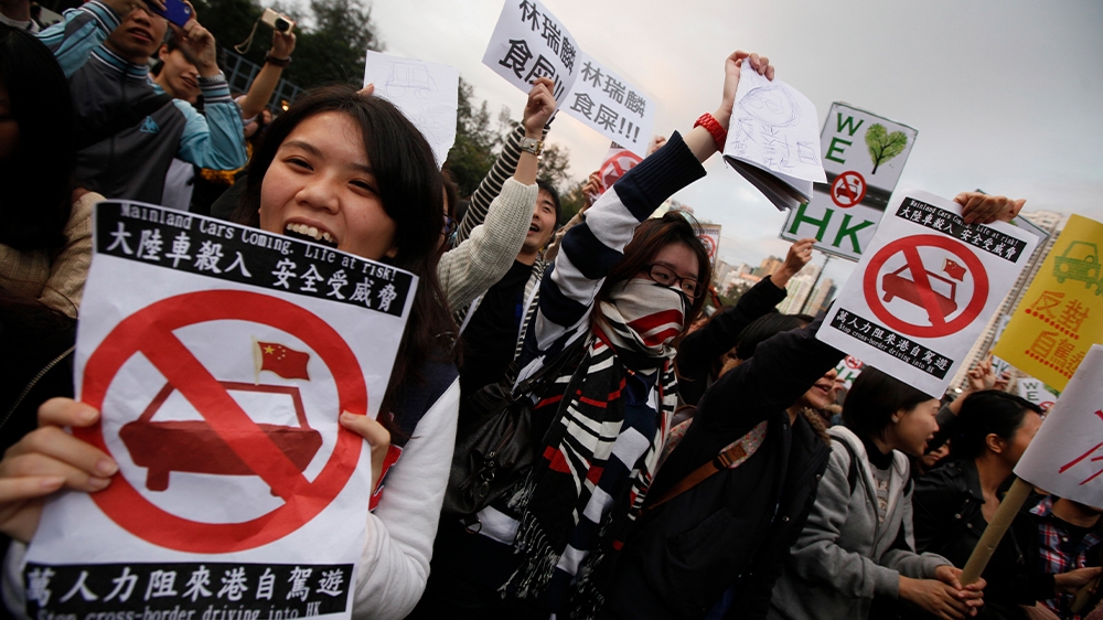 Since the handover, there has been increasing friction between Hong Kong people and mainland Chinese [Kin Cheung/AP Photo