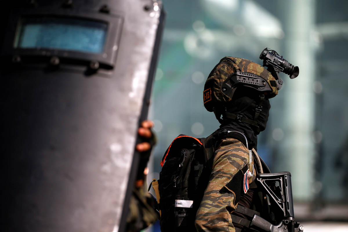 Soldiers exit Terminal 21 shopping mall after completing their mission following a gun battle involving a Thai soldier on a shooting rampage, in Nakhon Ratchasima, Thailand February 9, 2020. REUTERS/S
