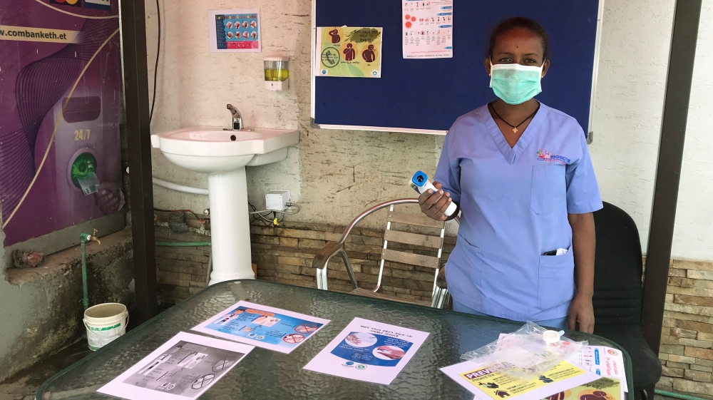 An Ethiopian health worker stands at a testing station amid concerns about the spread of coronavirus disease (COVID-19) in Addis Ababa