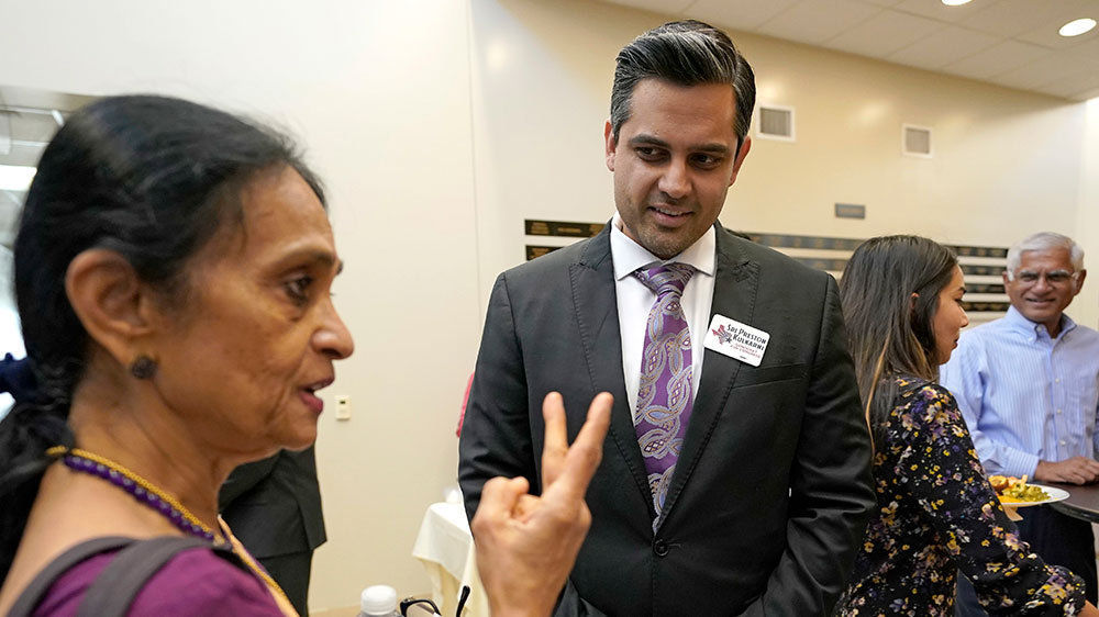 Thara Narasimhan, left, talks with Democrat for Congress candidate Sri Kulkarni during a fundraiser in Houston