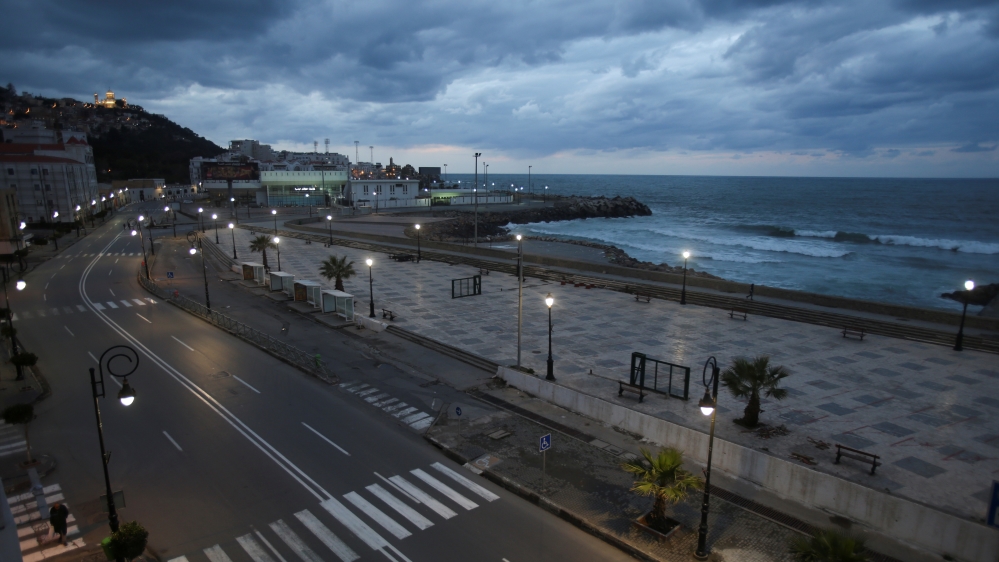 A general view shows an empty street after a curfew was imposed from 7pm-7am to prevent the spread of the coronavirus disease (COVID-19), in Algiers