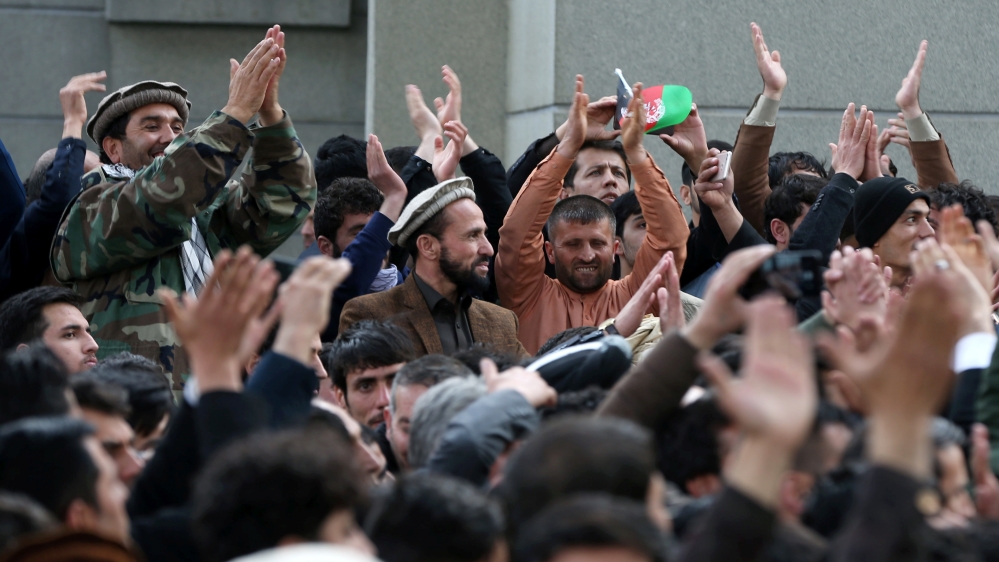 Supporters of Afghanistan''s Abdullah Abdullah, attend his swearing-in ceremony as president, in Kabul