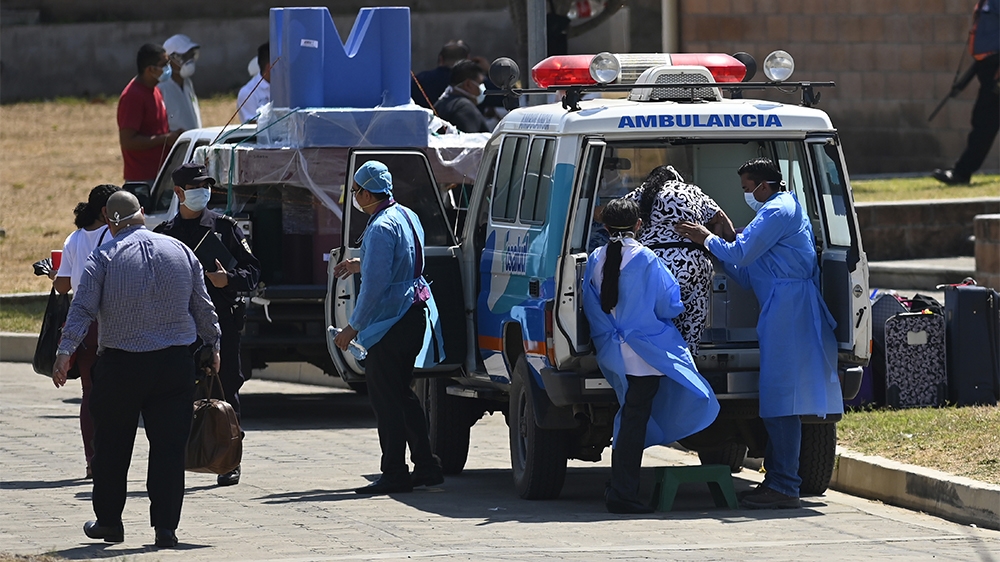 Passengers are transferred to a hospital from a state shelter where passengers suspected of been infected with Coronavirus are quarantined as a preventive measure in the face of the global COVID-19 co