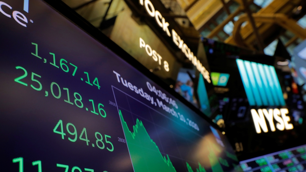 The Dow Jones Industrial Average is displayed after the closing bell on the floor of the New York Stock Exchange (NYSE) in New York City, New York