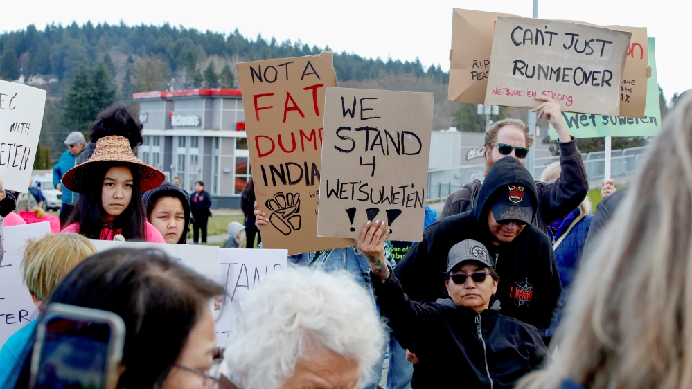 Supporters of Wet’suwet’en land defenders block a highway in Victoria, British Columbia, as part of protests against the Coastal GasLink pipeline