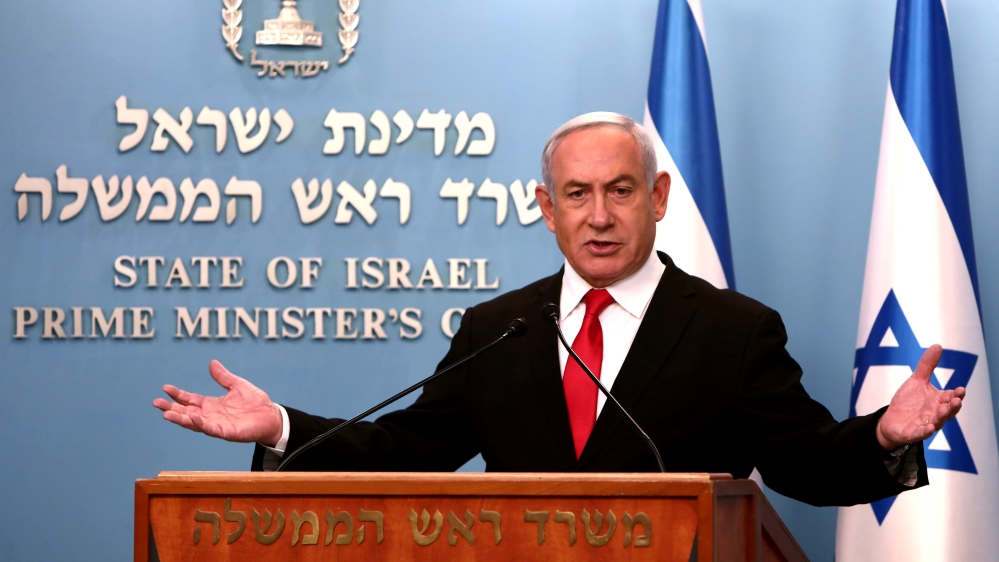 Israeli Prime Minister Benjamin Netanyahu delivers a speech at his Jerusalem office