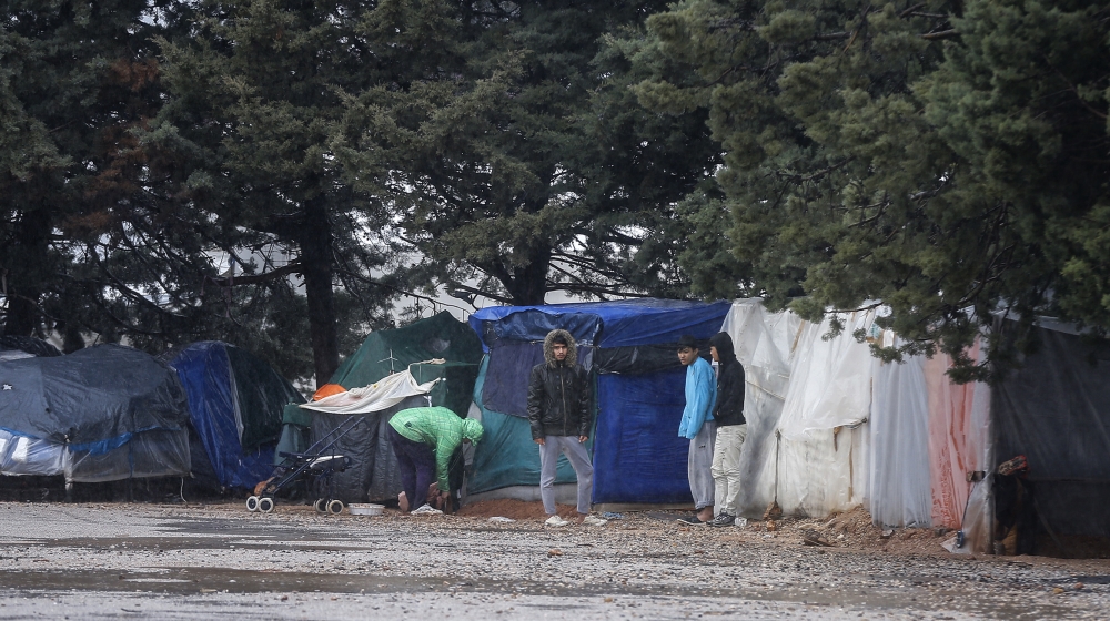 Children are seen at Malakasa refugee camp after the camp has been quarantined following a man tested positive for coronavirus (COVID-19) in Athens, Greece on April 5, 2020. (Photo by Ayhan Mehmet/Ana