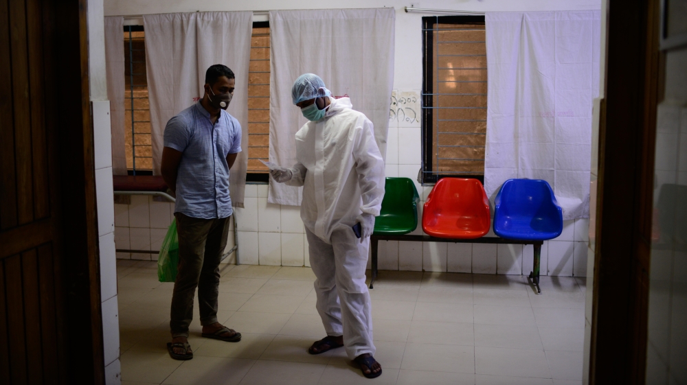 Bangladesh doctor's on duty during coronavirus [Mahmud Hossain Opu/Al Jazeera]