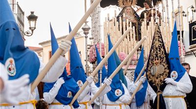 Spain Catholics make masks as they forgo famed Easter processionsSpain Catholics make masks as they forgo famed Easter processions