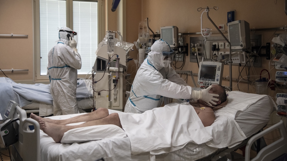 Doctors attend to patients in intensive care in the COVID-19 ward of the Maria Pia Hospital in Turin. The Piedmont region around the industrial city of Turin reported 854 COVID-19 related deaths. MARC