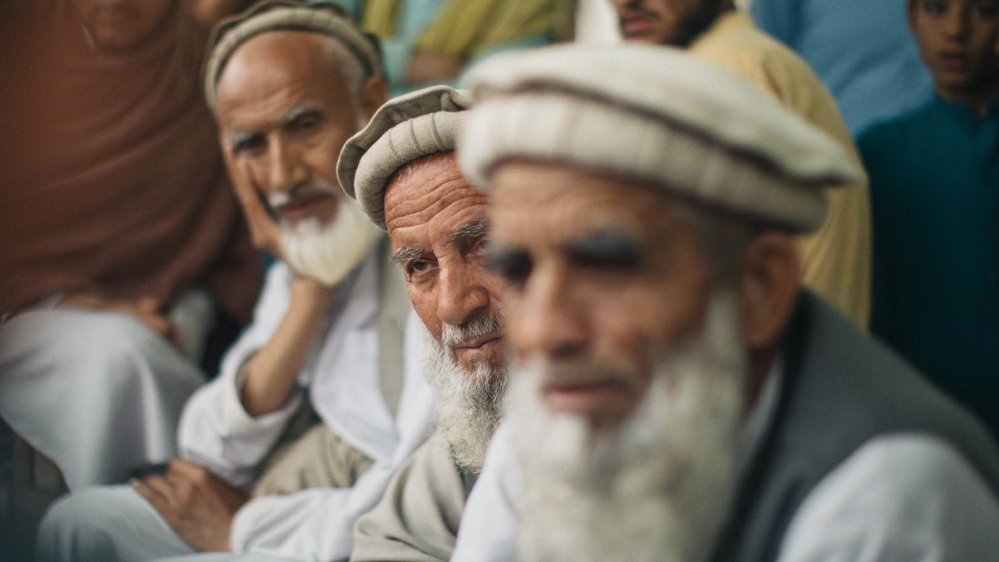 Village elders in Garbawa [Maciej Stanik/Al Jazeera]