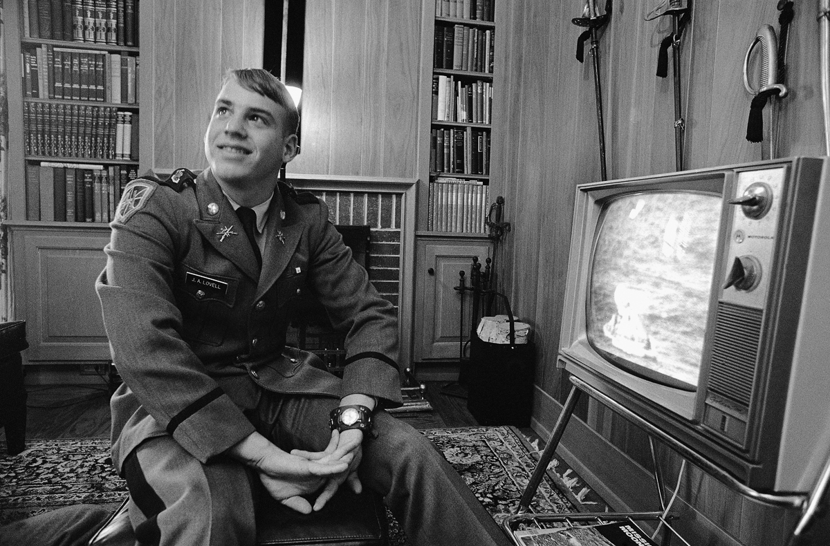James A. Lovell III breaks into broad smile as he watches his dad climb out of Apollo 13 command capsule. Young Lovell, 15-year-old cadet at St. John?s Military Academy, watched the space recovery on