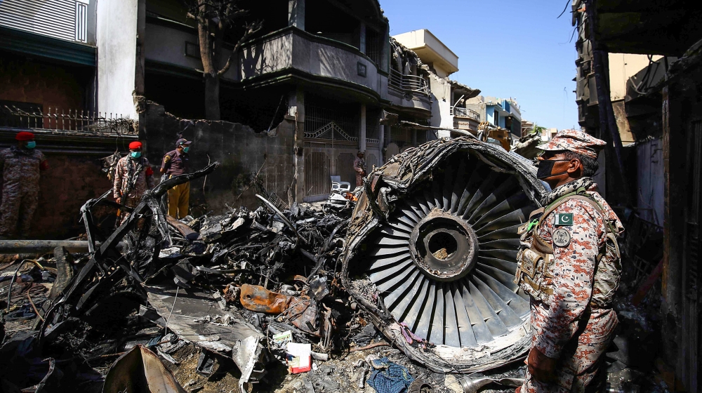 Wreckage of state run Pakistan International Airlines, Airbus A320 is lying amid houses of a residential colony days after it crashed, in Karachi, Pakistan, 24 May 2020. The death toll in a plane cras