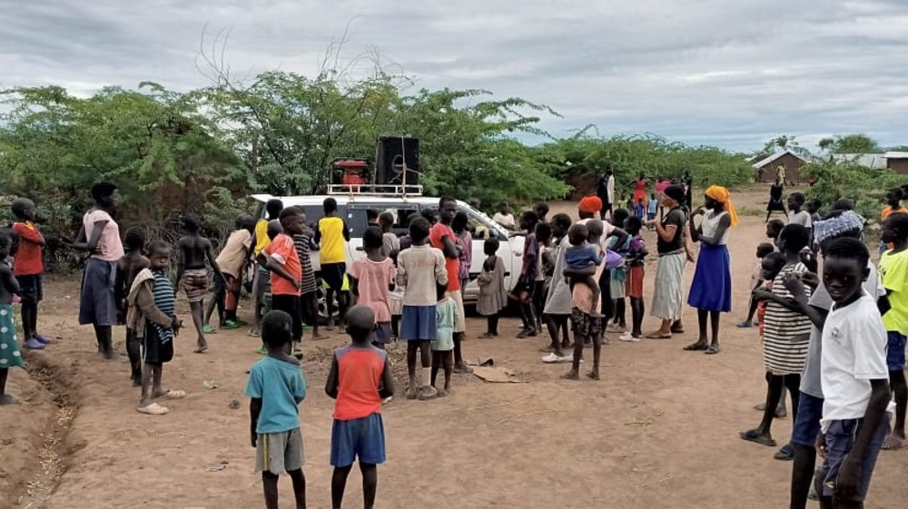 A van drives through the Kakuma refugee camps, broadcasting multilingual messages about the coronavirus (credit: Capital Juba studios)
