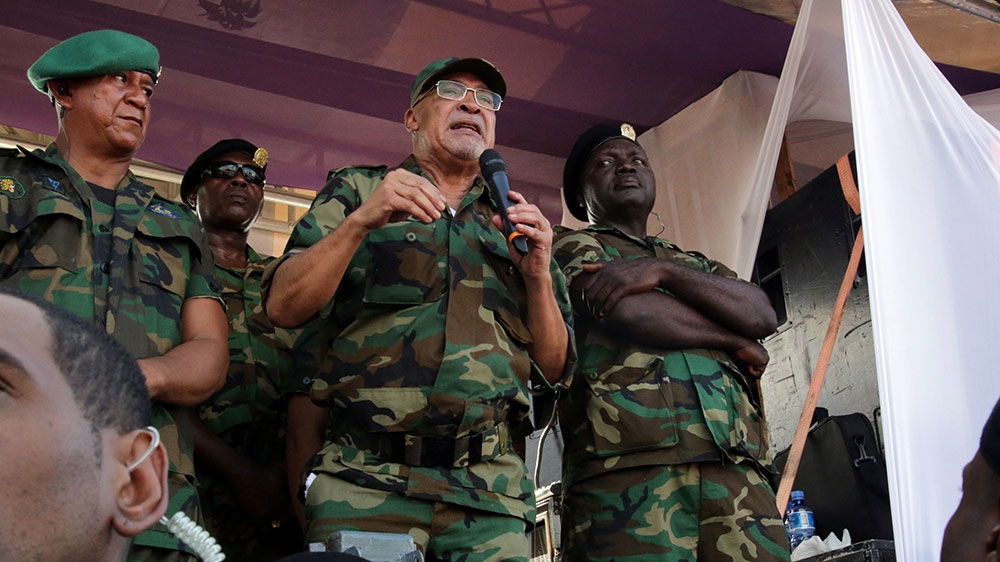 Suriname’s President Desi Bouterse addresses supporters after appearing in court, where he had been found guilty of murder in absentia for the 1982 execution of 15 activists, in Paramaribo, Suriname