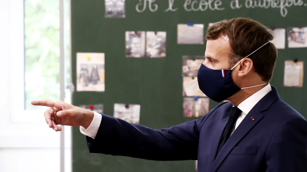 French President Macron visits a school in Poissy