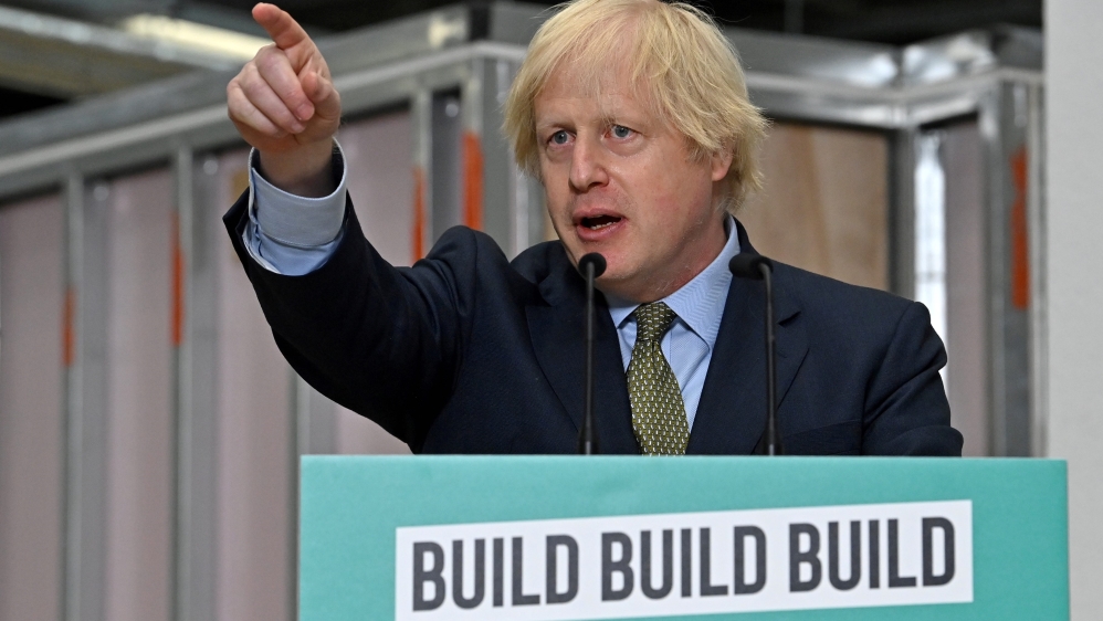 Britain’s Prime Minister Boris Johnson gestures as he delivers a speech