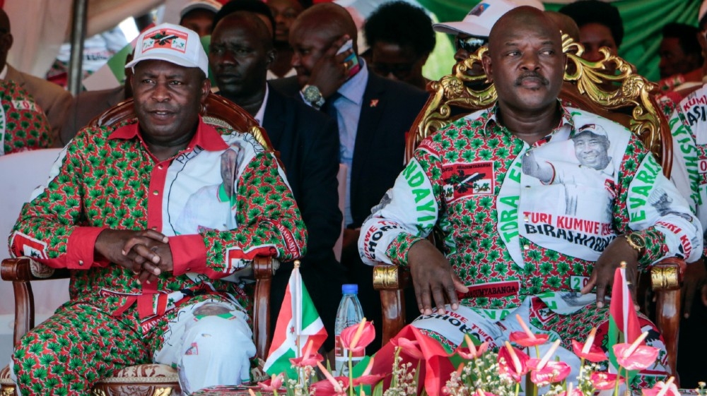 Burundi’s incumbent president Pierre Nkurunziza (R) and Evariste Ndayishimiye, presidential candidate of the ruling party the National Council for the Defense of Democracy 
