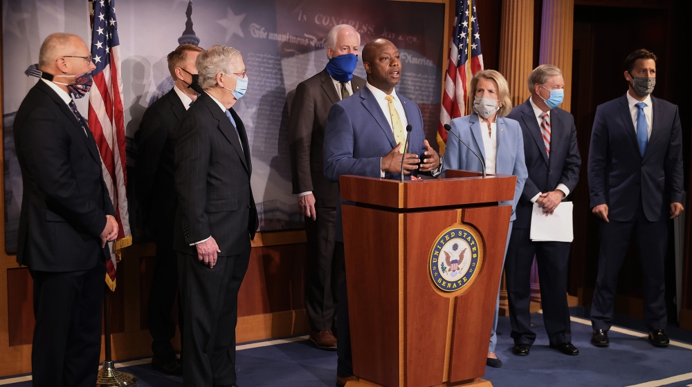 WASHINGTON, DC - JUNE 17: Sen. Tim Scott (R-SC) (C) is joined by Senate Majority Leader Mitch McConnell (R-KY), Senate Judiciary Committee Chairman Lindsey Graham (R-SC), Sen. Shelley Moore Capito (R-