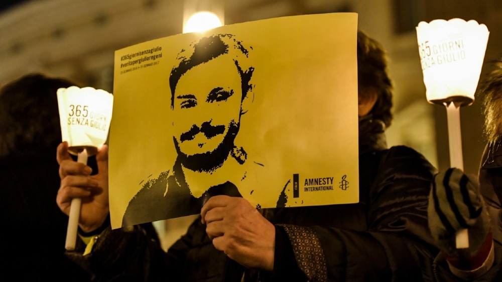 ITALY-EGYPT-AMNESTY-TORTURE-CRIME-DEMO-REGENI Activists of human rights organization Amnesty International hold a picture of G