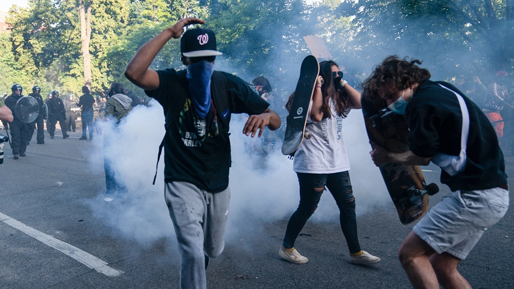 Demonstrators gather to protest the death of George Floyd, Monday, June 1, 2020, near the White House in Washington. Floyd died after being restrained by Minneapolis police officers. (AP Photo/Evan Vu