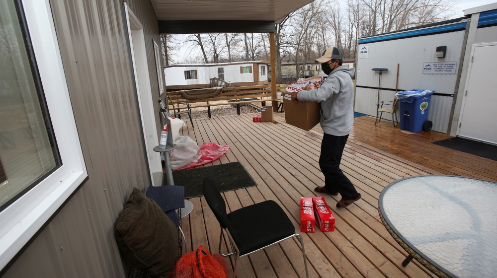 Migrant workers from Mexico have groceries delivered, wear masks and practice social distancing to help prevent the spread of the coronavirus disease (COVID-19) during a mandatory 14-day quarantine af