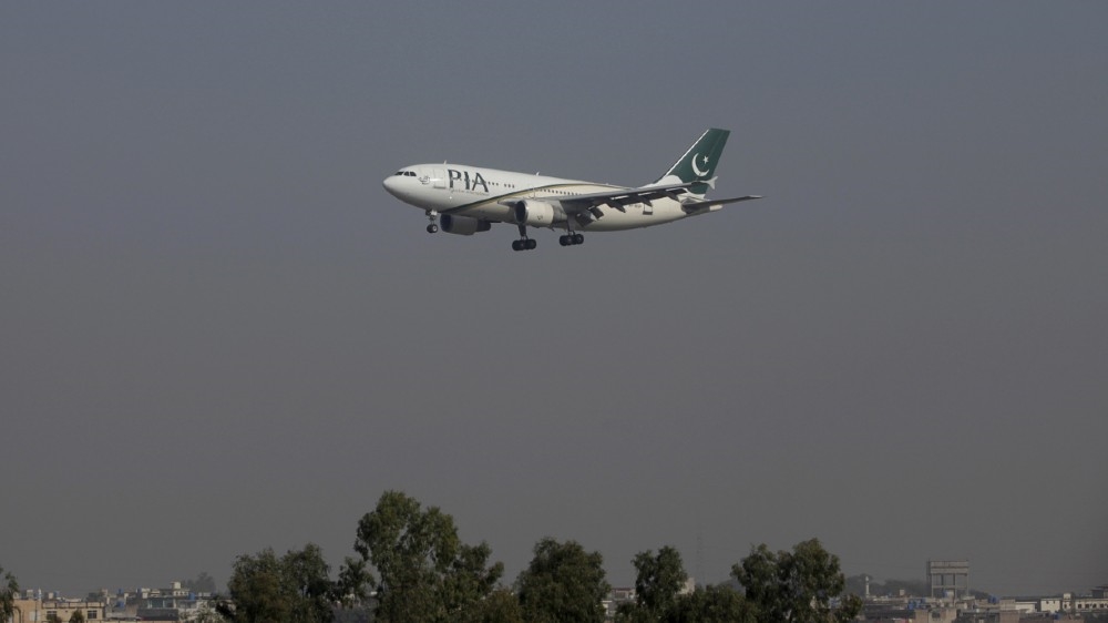 A Pakistan International Airlines (PIA) passenger plane arrives at the Benazir International airport in Islamabad, Pakistan, December 2, 2015. Employees of Pakistan''s ailing