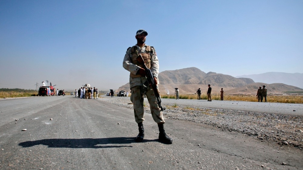 A dparamilitary soldier stands near the site of a bomb blast in the outskirts of Quetta September 23, 2011. Suspected militants detonated a remote-controlled bomb in southwestern