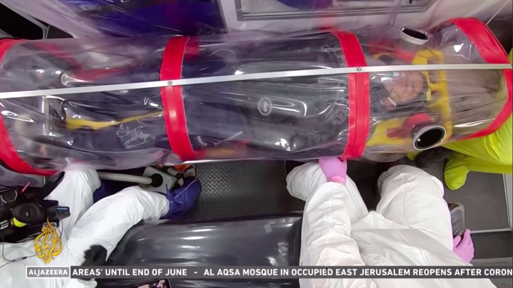 Jose Luis in capsule inside of an ambulance