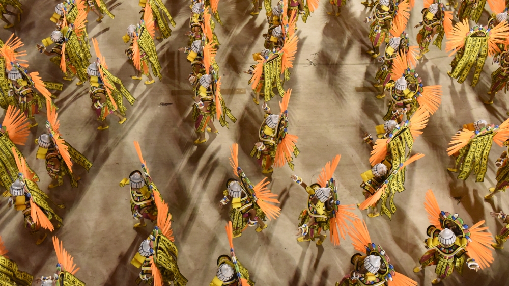 Members of samba schools parade during the 2020 Carnival at the Sambadrome Marques de Sapucai in Rio de Janeiro, Brazil