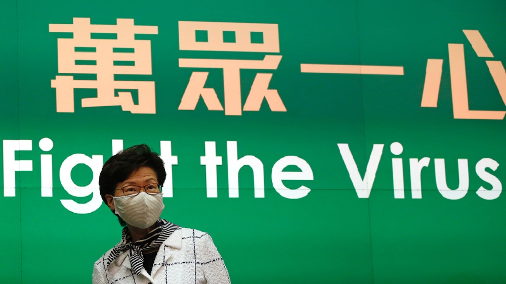 Hong Kong Chief Executive Carrie Lam, wearing a protective mask, outlined the new measures at a special press conference on Monday night