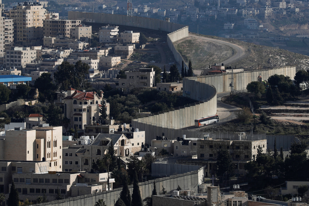 A general view shows the Israeli barrier at the Palestinian town of Abu Dis in the Israeli-occupied West Bank east of Jerusalem January 27, 2020. REUTERS/Ammar Awad