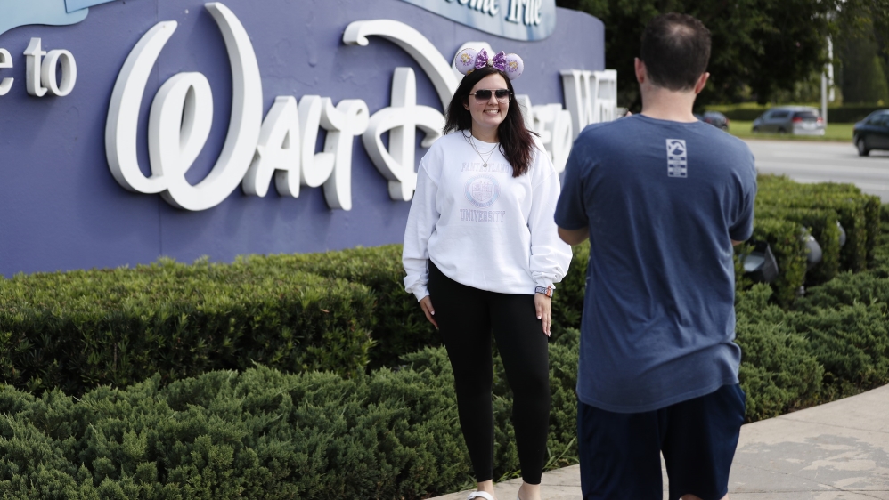 Walt Disney World theme park is scheduled to reopen on Saturday despite a surge in new COVID-19 infections throughout Florida