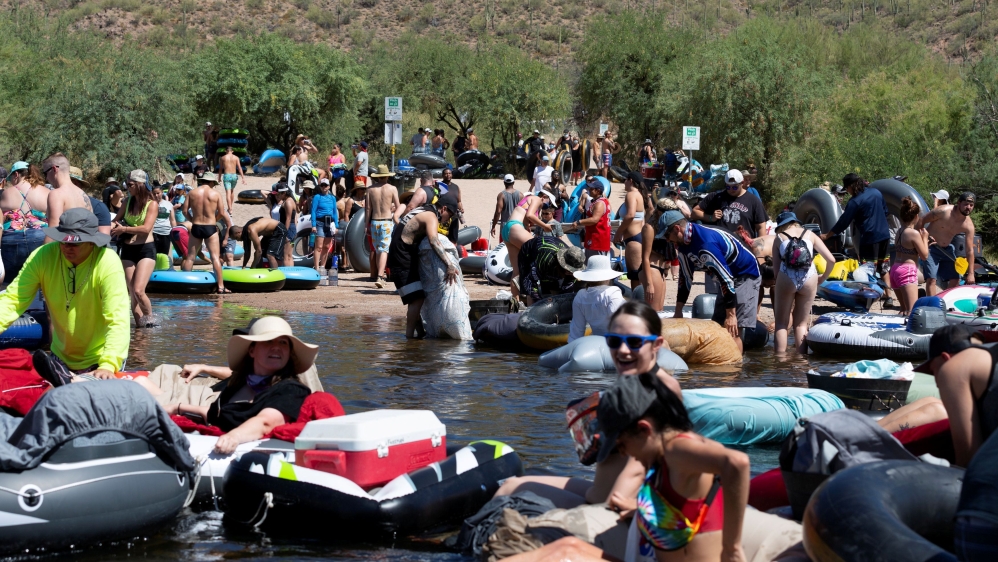 People prepare to go tubing on Salt River amid the outbreak of the coronavirus disease (COVID-19) in Arizona, US