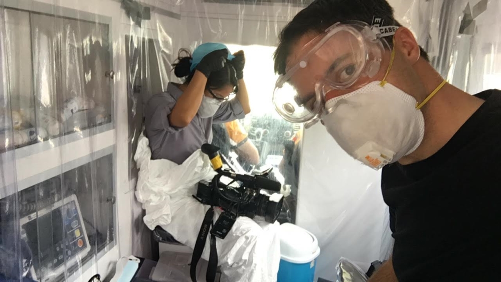 John and Vanessa in a COVID ambulance