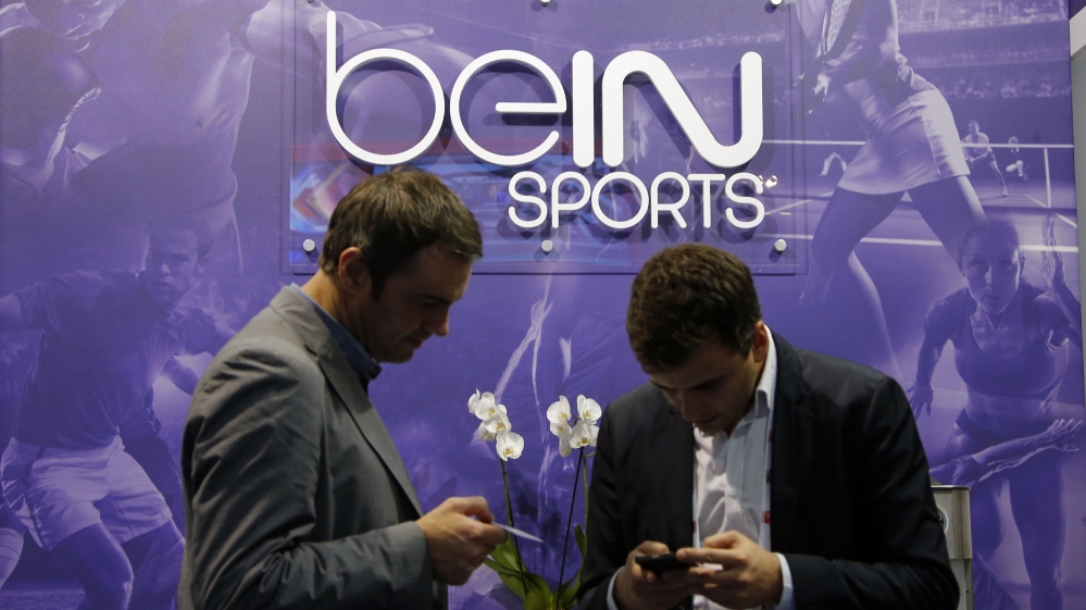 Visitors are seen at the French TV channel ''beIN Sport'' stand during the Sportel in Monte Carlo