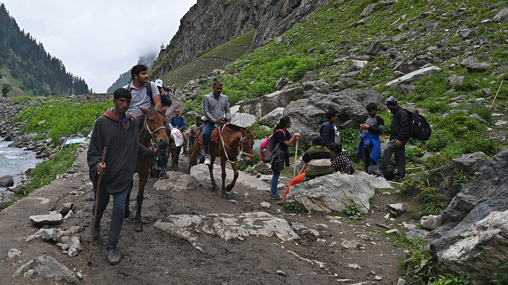 Hindu pilgrims undertake their journey towards the sacred Amarnath Caves