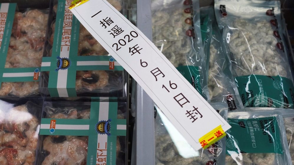 Frozen seafood products made of imported shrimps inside a sealed freezer at a supermarket following a new outbreak of the coronavirus disease in Beijing