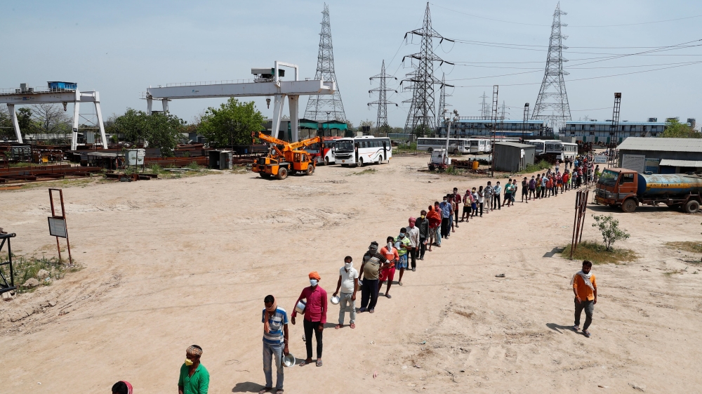Daily wage labourers stand