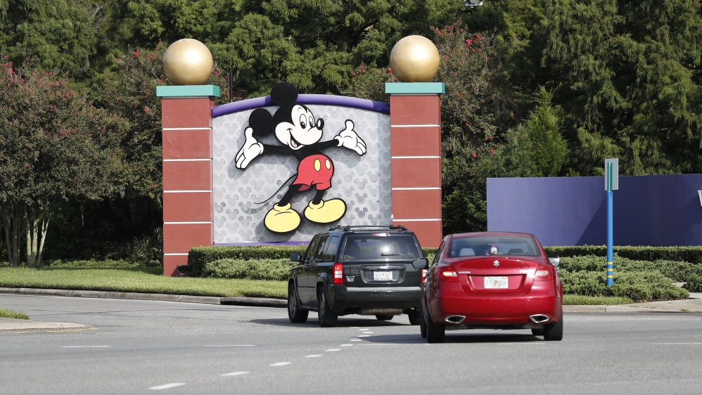 A view of Mickey Mouse sign at the Walt Disney World theme park entrance in Lake Buena Vista, Florida